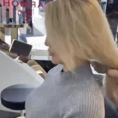 Blonde cut being finished in the salon